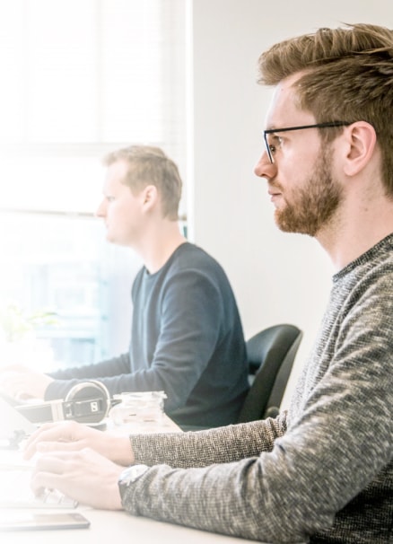 Developers focusing at work in a beautiful modern office.