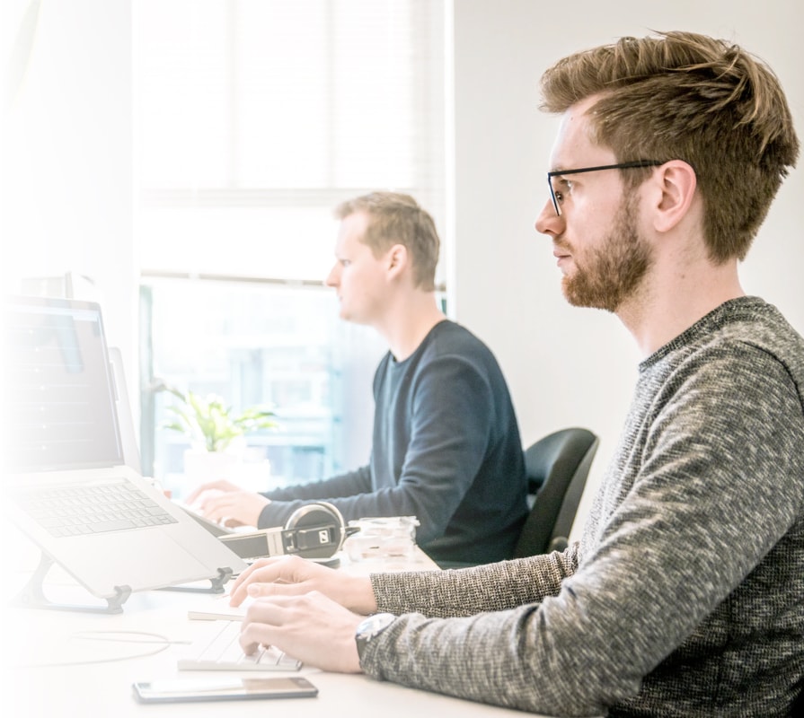 Developers focusing at work in a beautiful modern office.